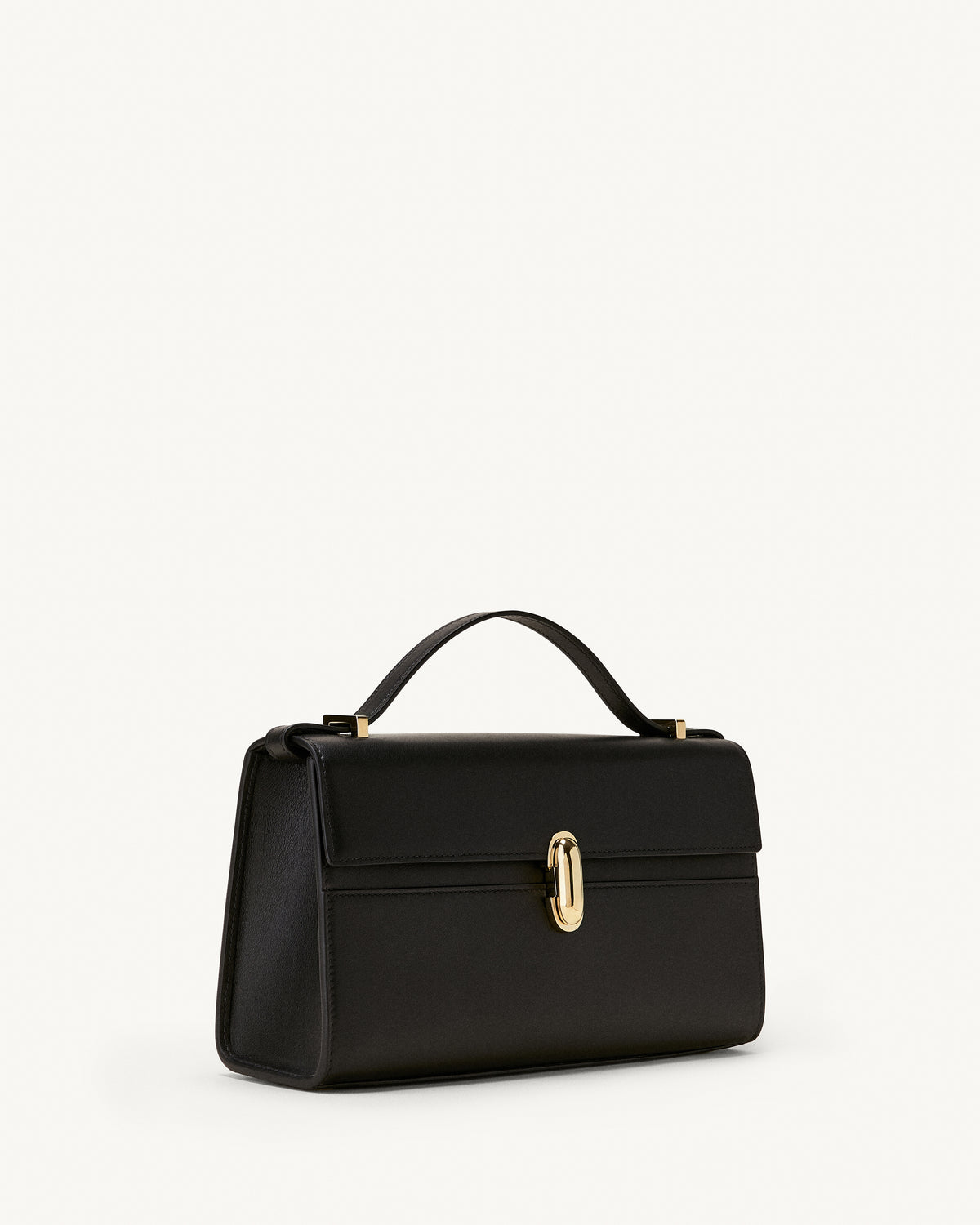 side view of a black leather bag with a gold clasp on a white background