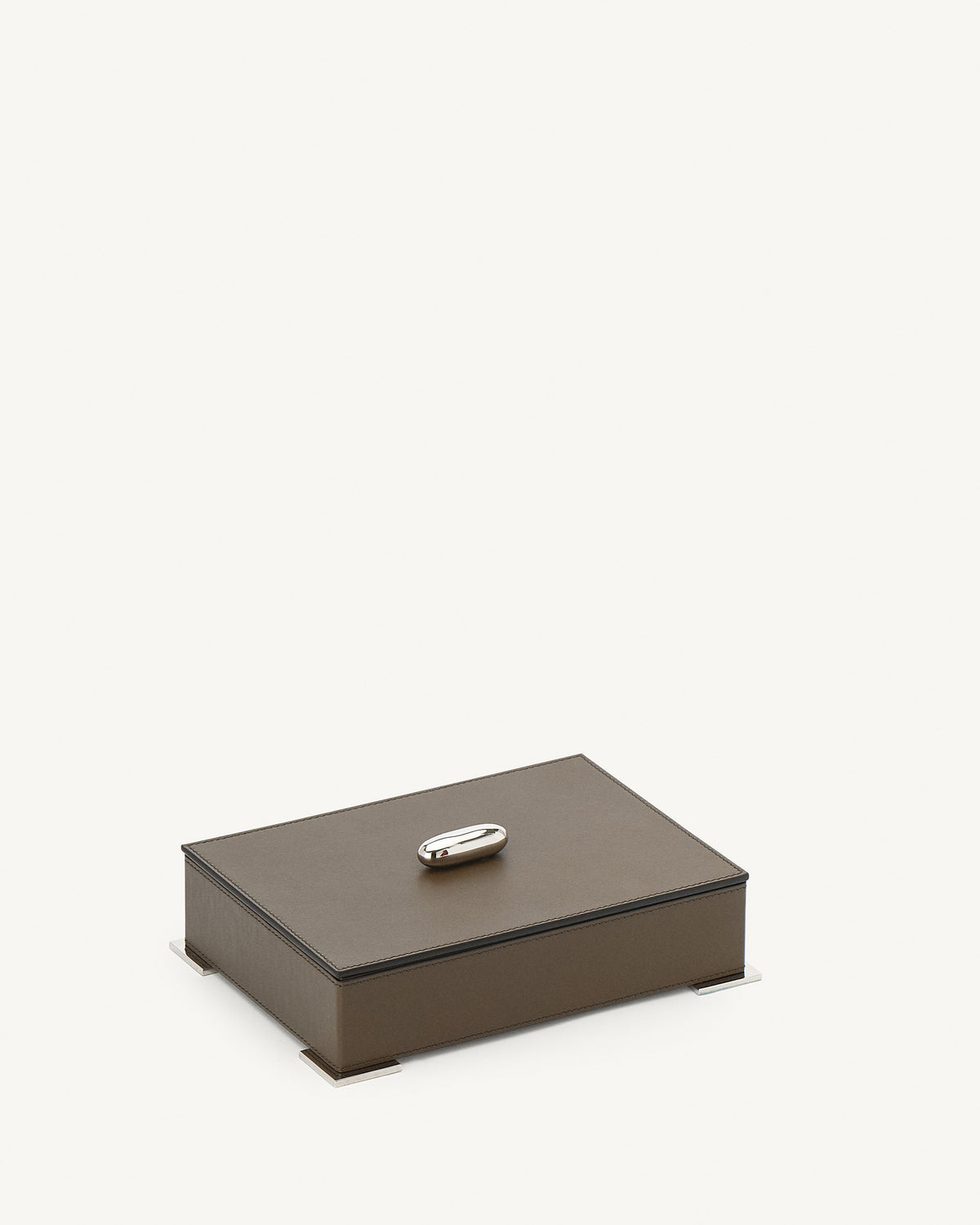 side view of a mink brown leather box with silver hardware on a white background