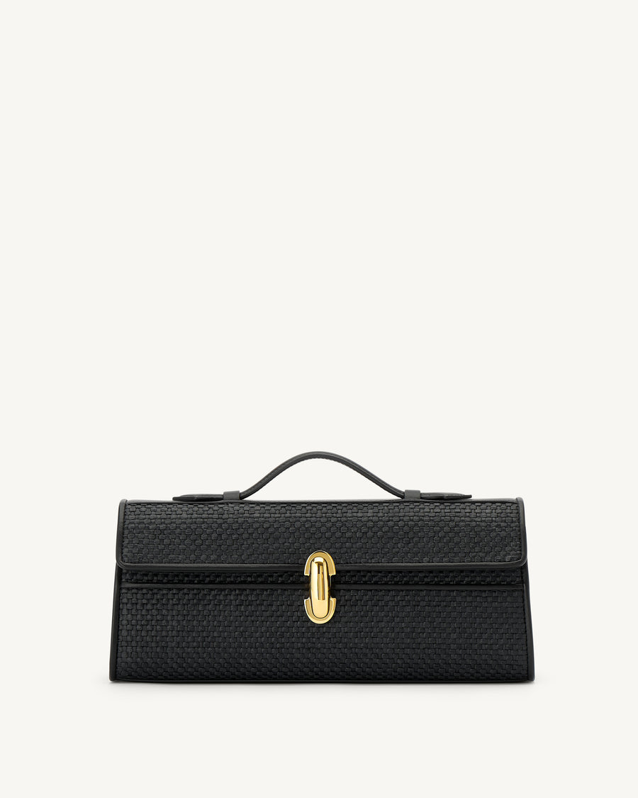 front view of a black raffia bag with leather trim with a gold clasp on a white background