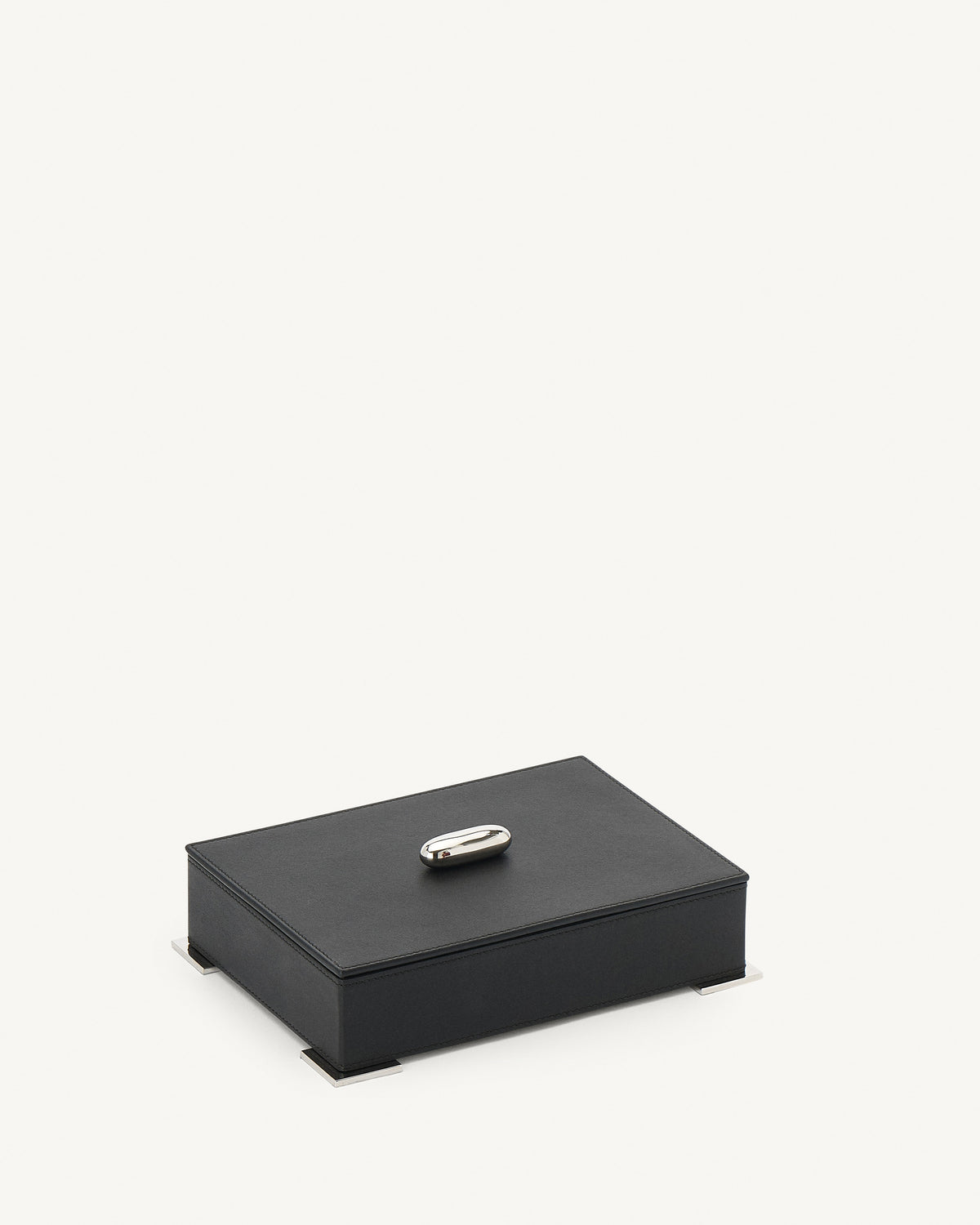 side view of an ebony black leather box with silver metal hardware on a white background