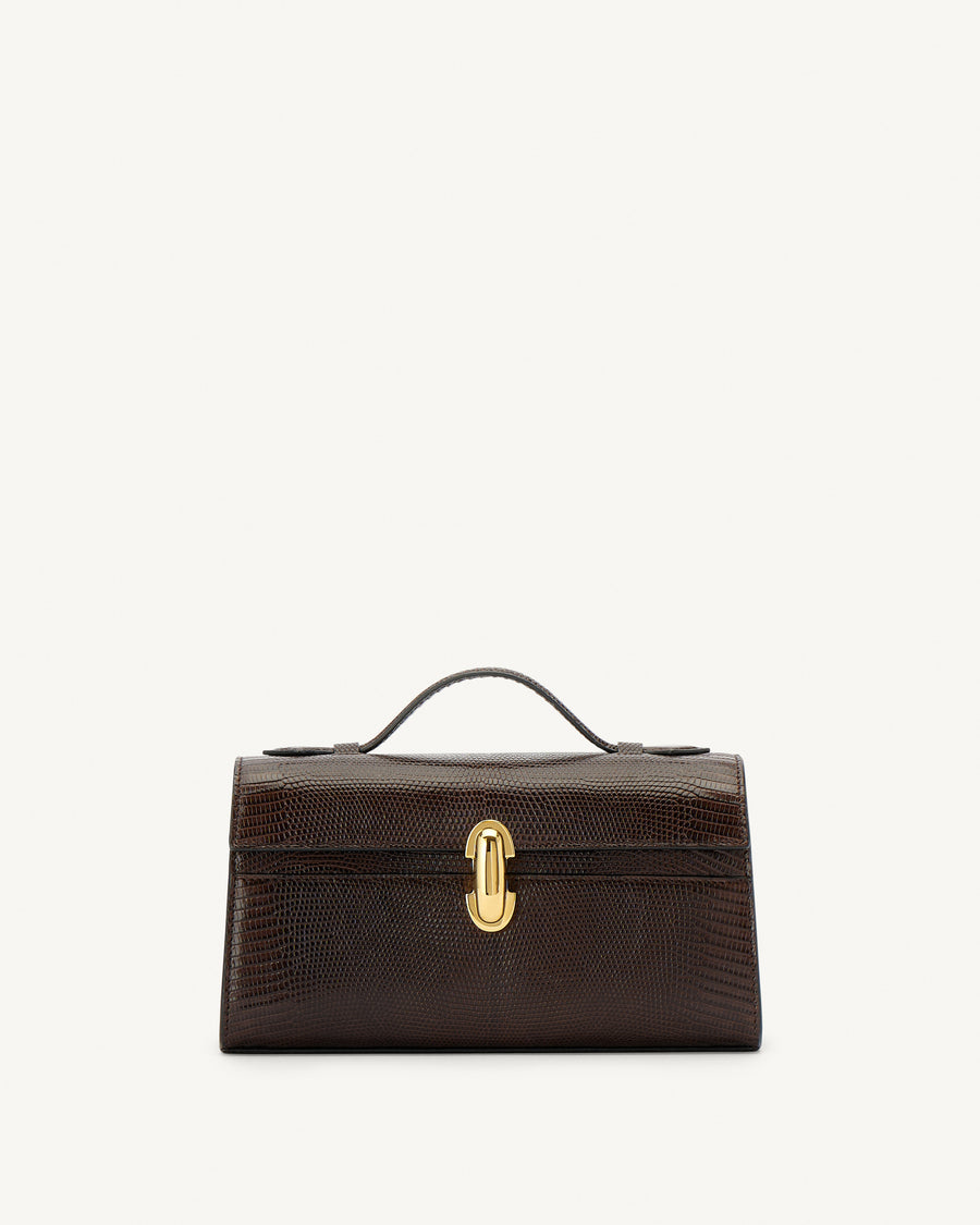 front view of currant brown lizard bag with gold clasp on a white background
