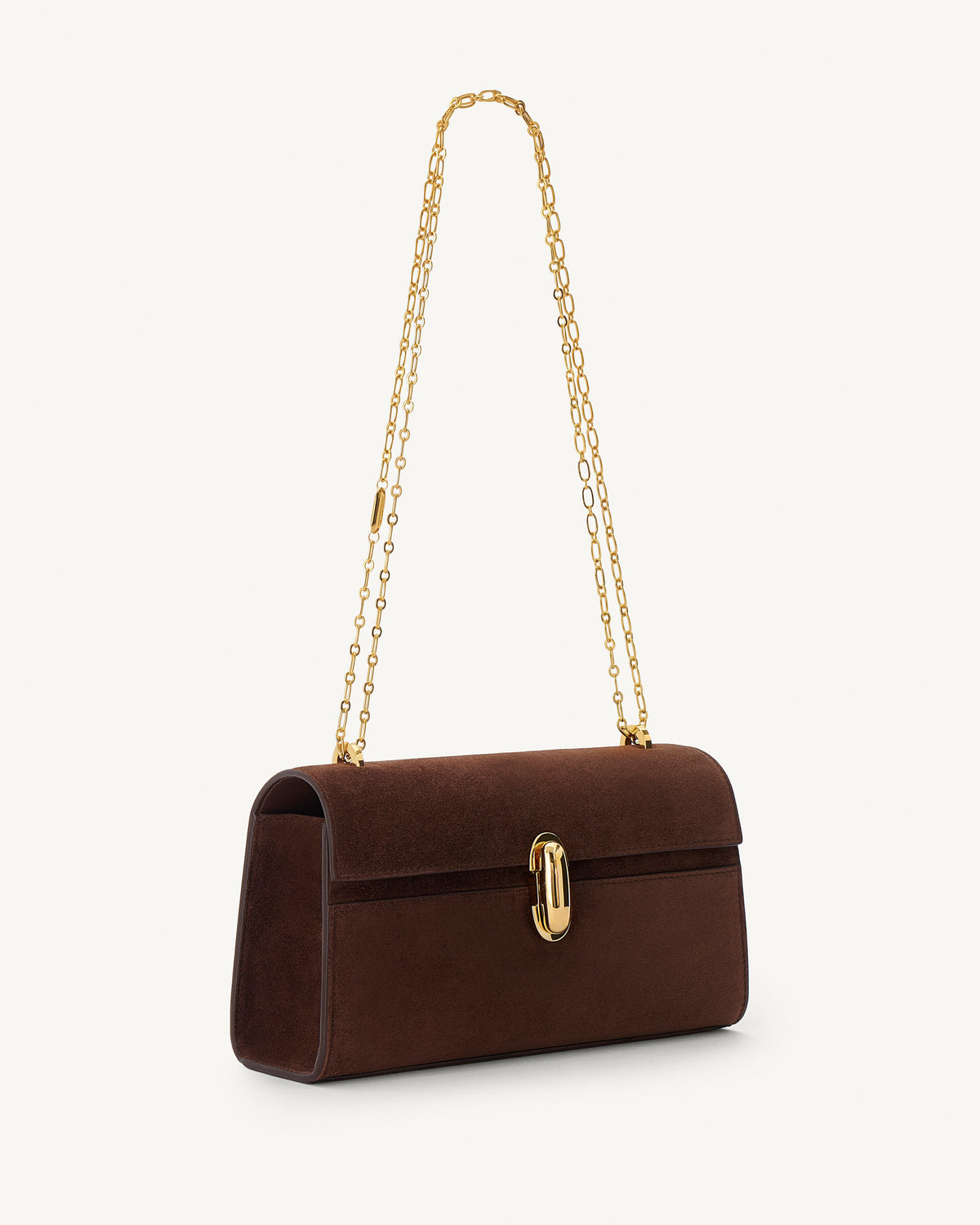 side view of espresso brown suede bag with gold clasp and gold chain on a white background