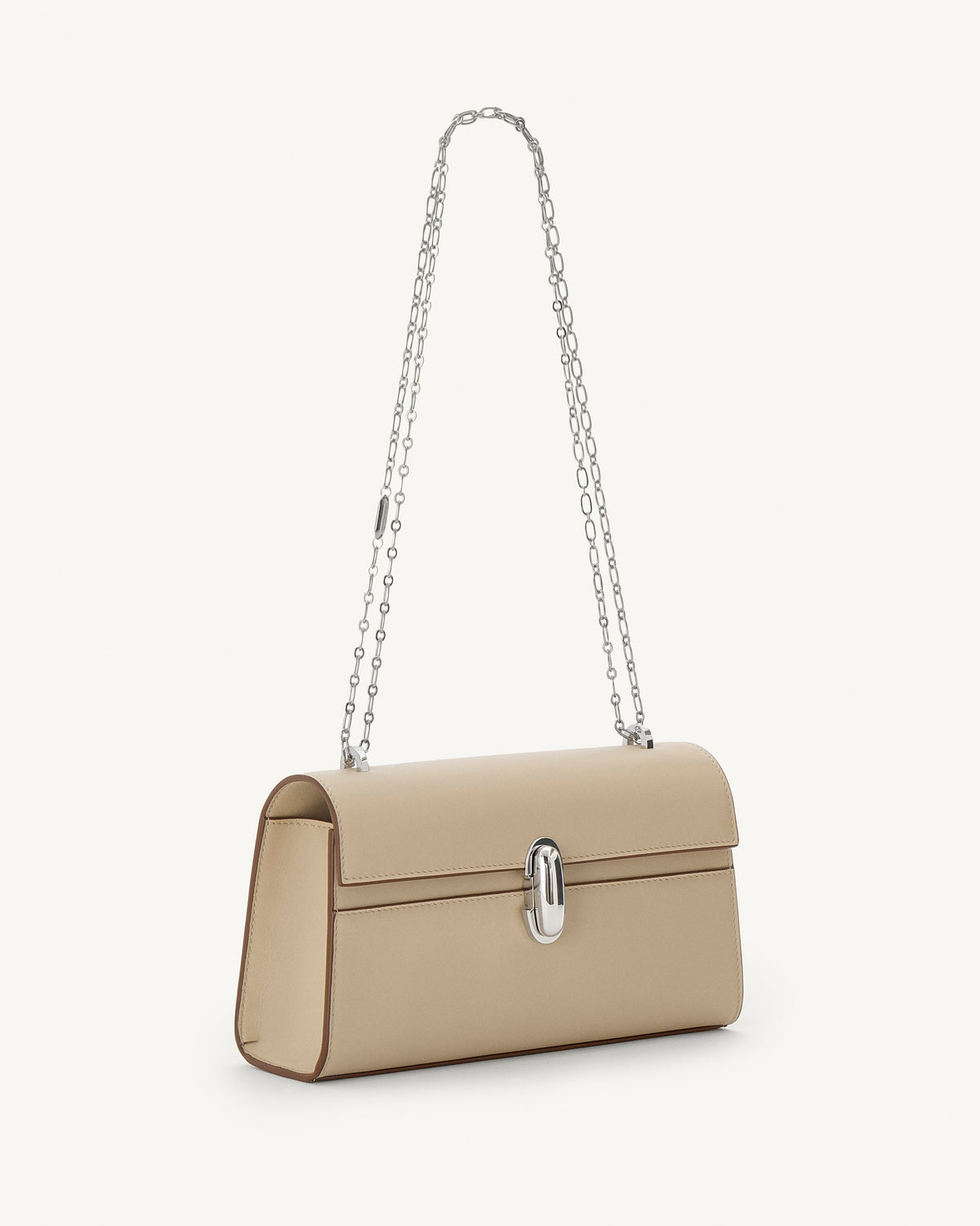 side view of bone beige bag with silver clasp and silver chain on a white background