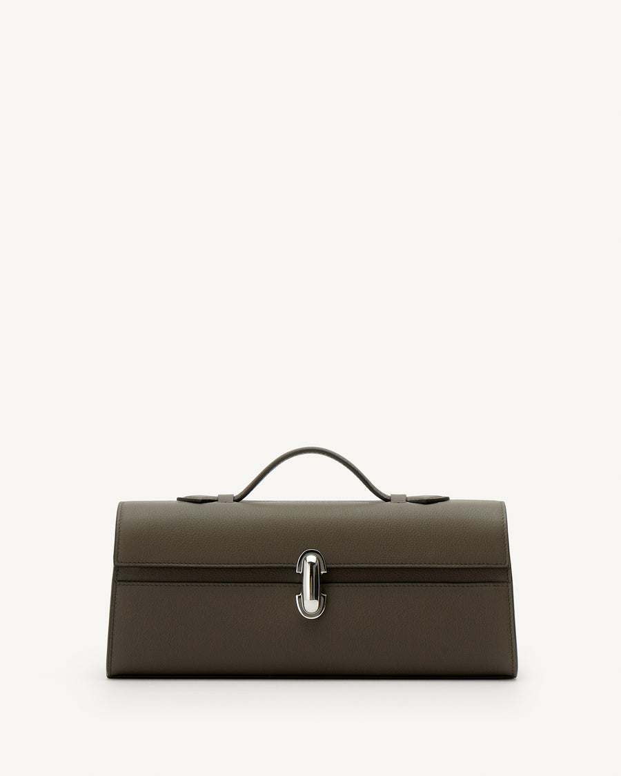 Front view of mink leather bag with a silver clasp on a white background