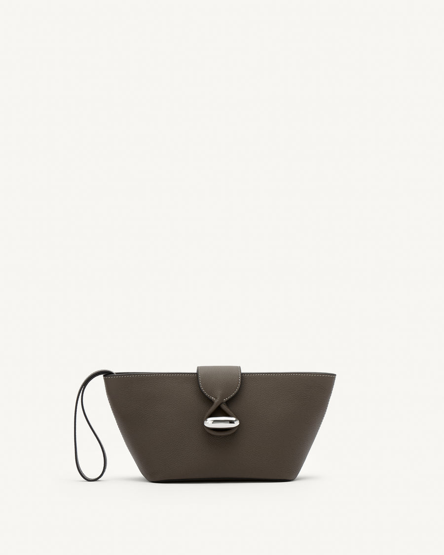 Front view of mink leather pouch with silver hardware