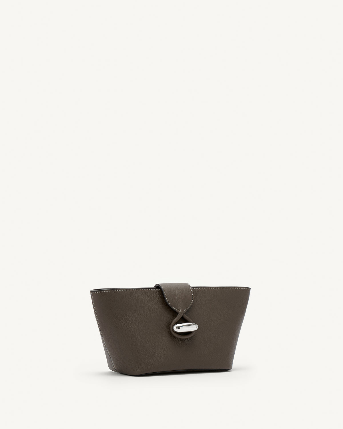 Side view of mink leather pouch with silver hardware