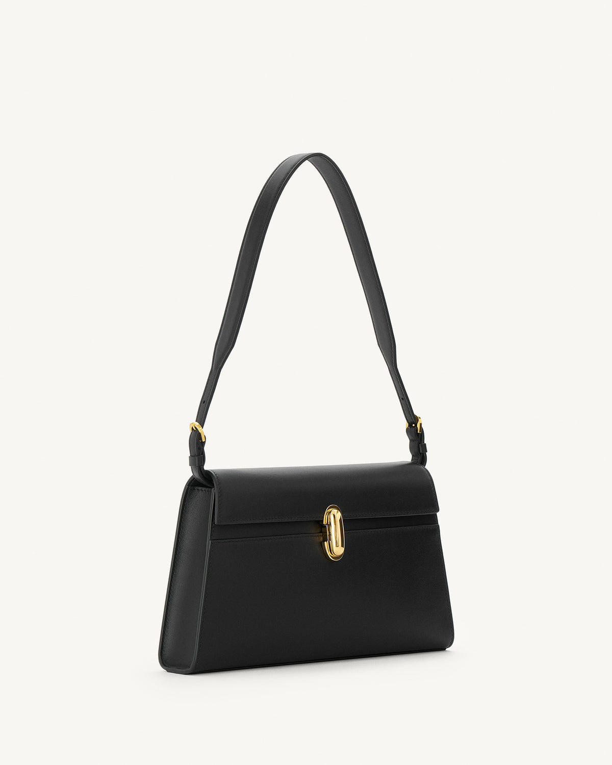 side view of black bag with gold clasp on a white background