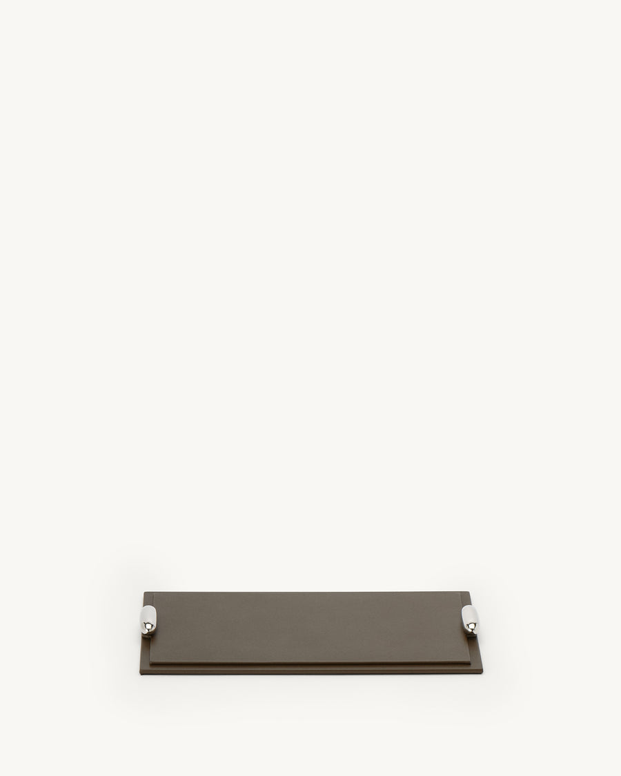 front view of a mink brown leather tray with silver hardware on a white background