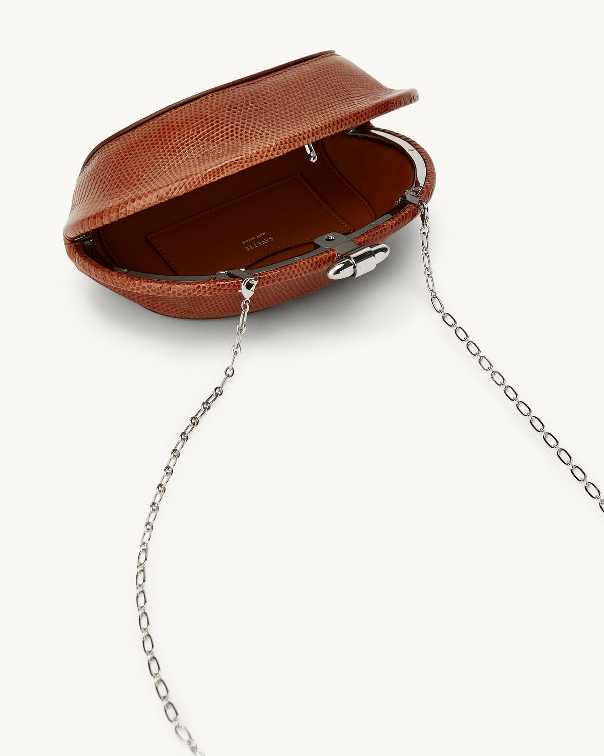 inside view of the Sera Clutch in Maple lizard 