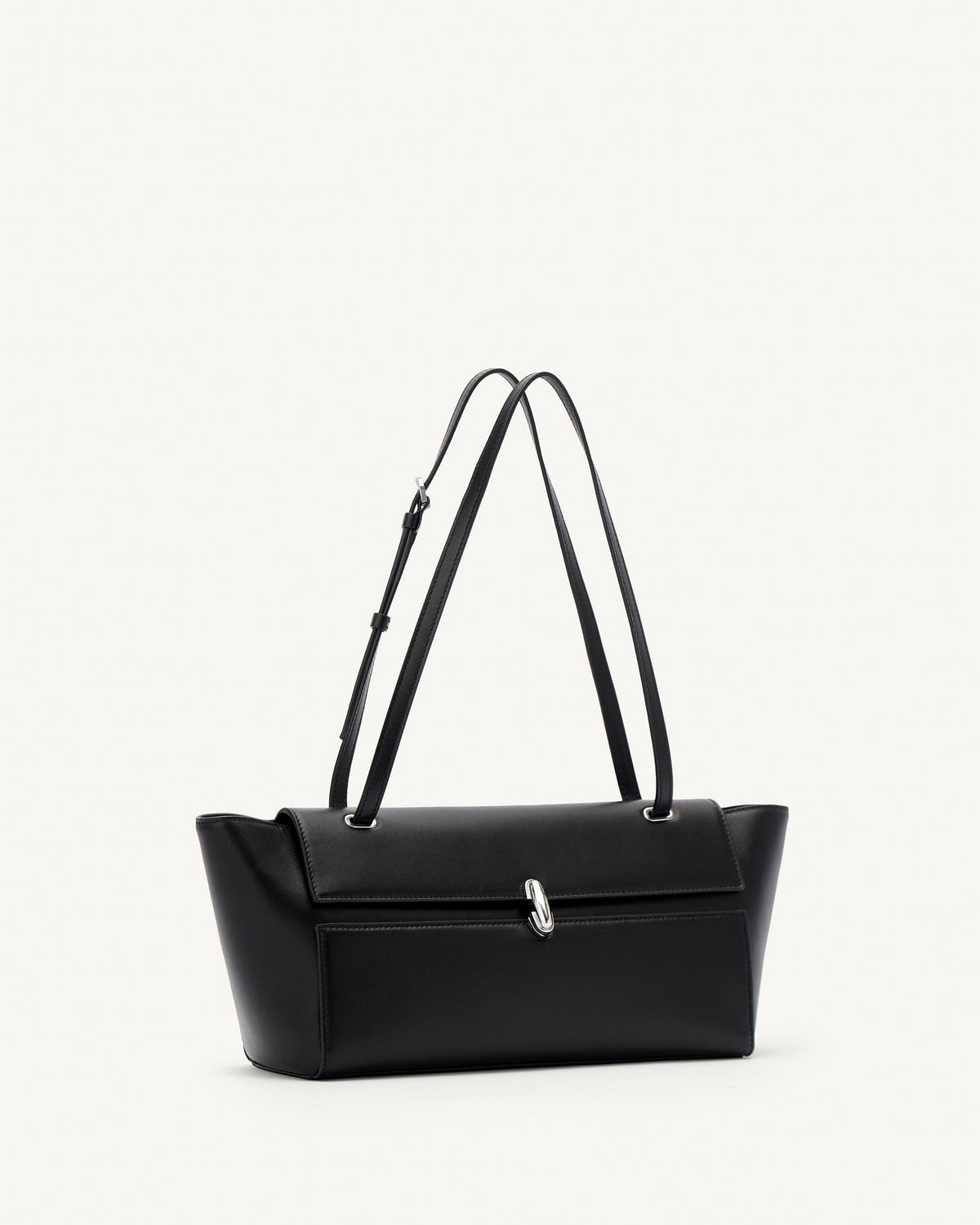 side view of black leather bag with a silver clasp on a white background