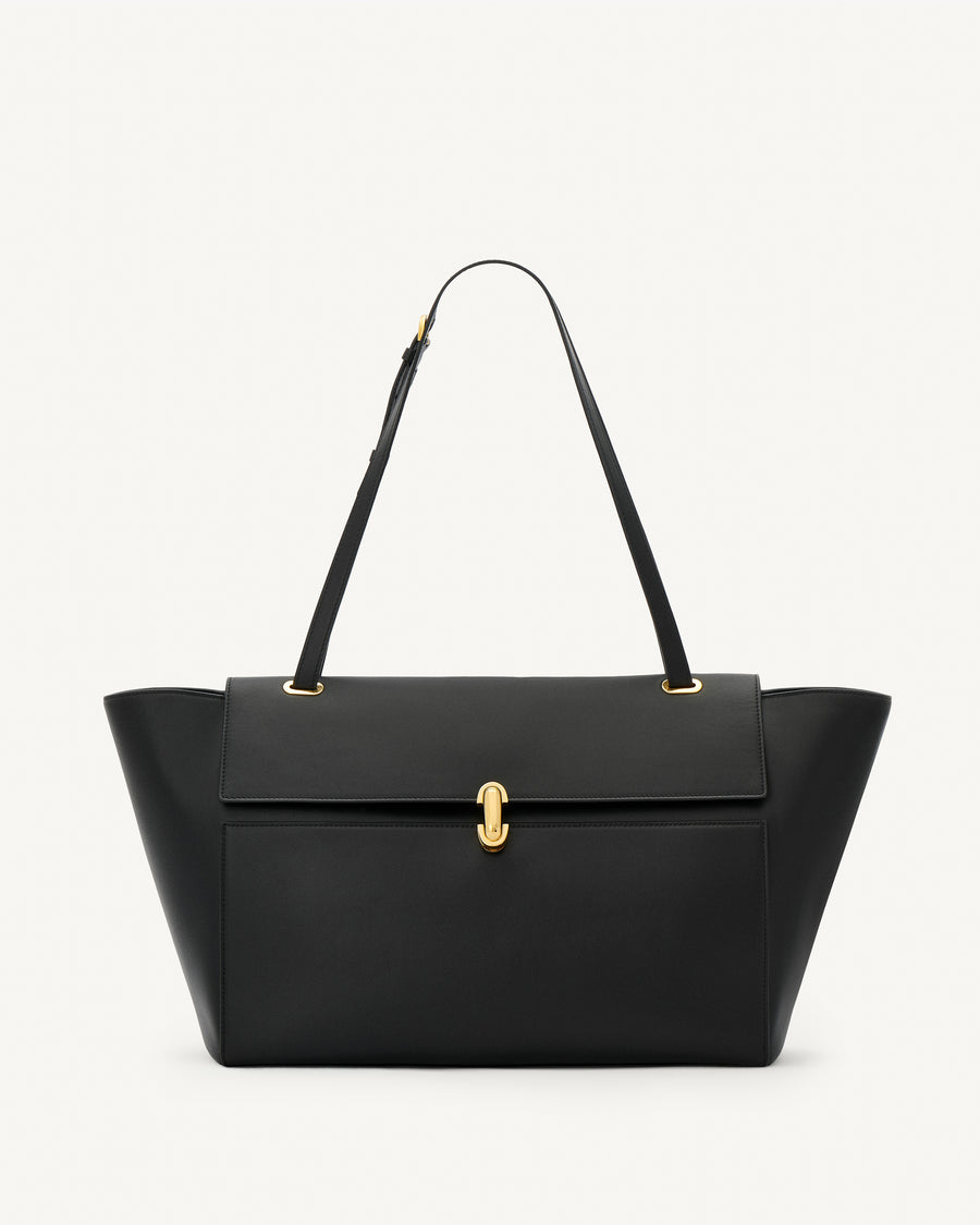 front view of a black leather tote bag with a gold clasp on a white background 