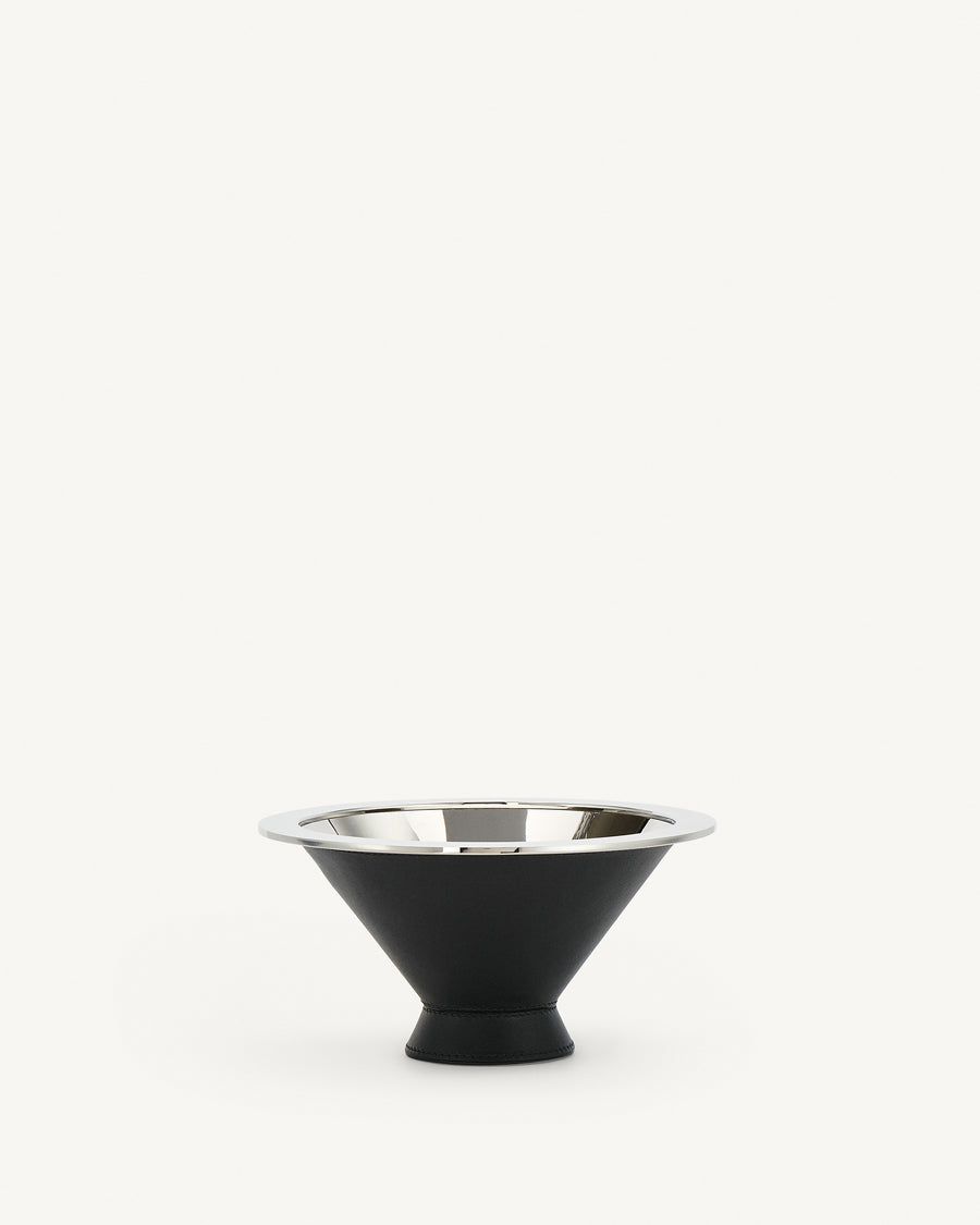 front view of a silver metal lined  ebony black leather dish on a white background