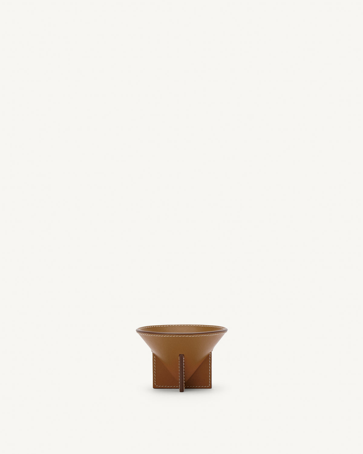 front view of saddle brown leather dish on a white background