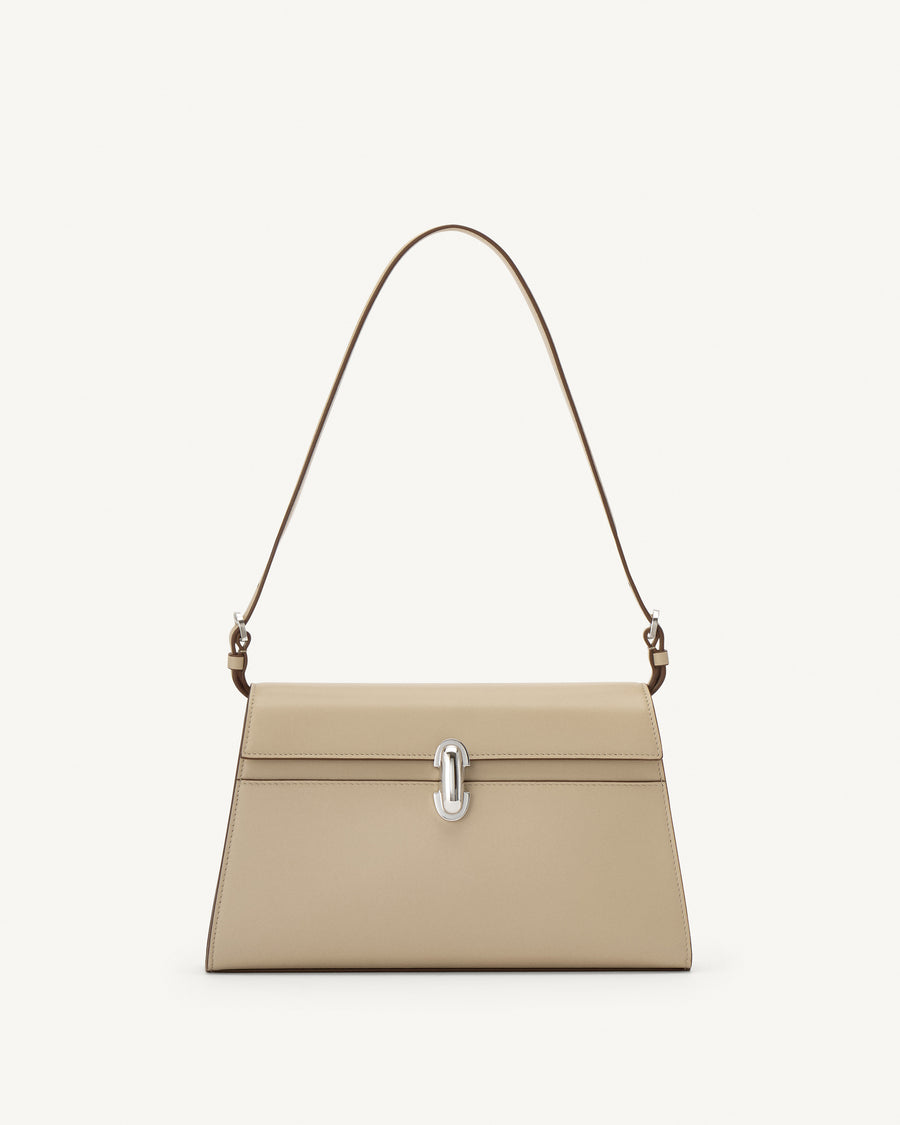 front view of a bone beige leather bag with a silver clasp on a white background