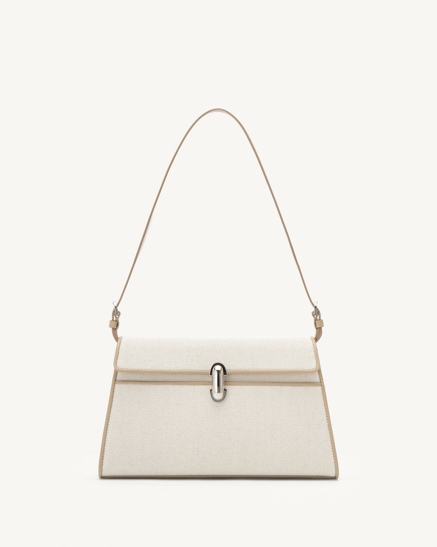 Front view of white canvas shoulder handbag with a silver chain strap on a white background