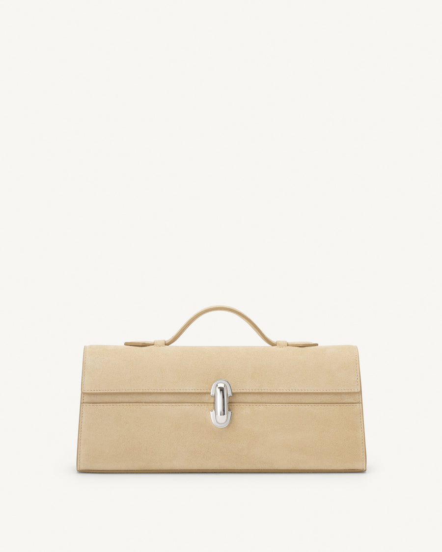 front view of flax beige suede bag with silver clasp on a white background