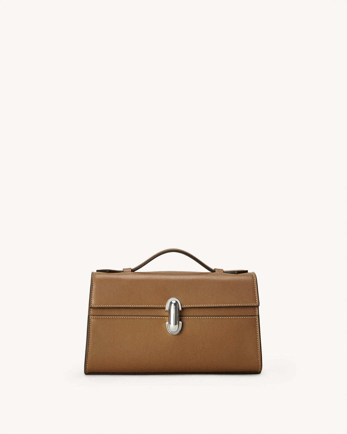 front view of a saddle brown leather bag with a silver clasp on a white background