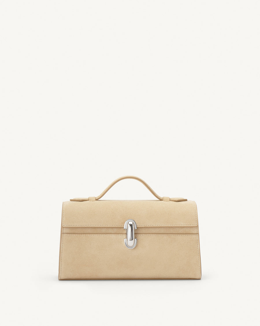 front view of a flax beige suede bag with a silver clasp on a white background