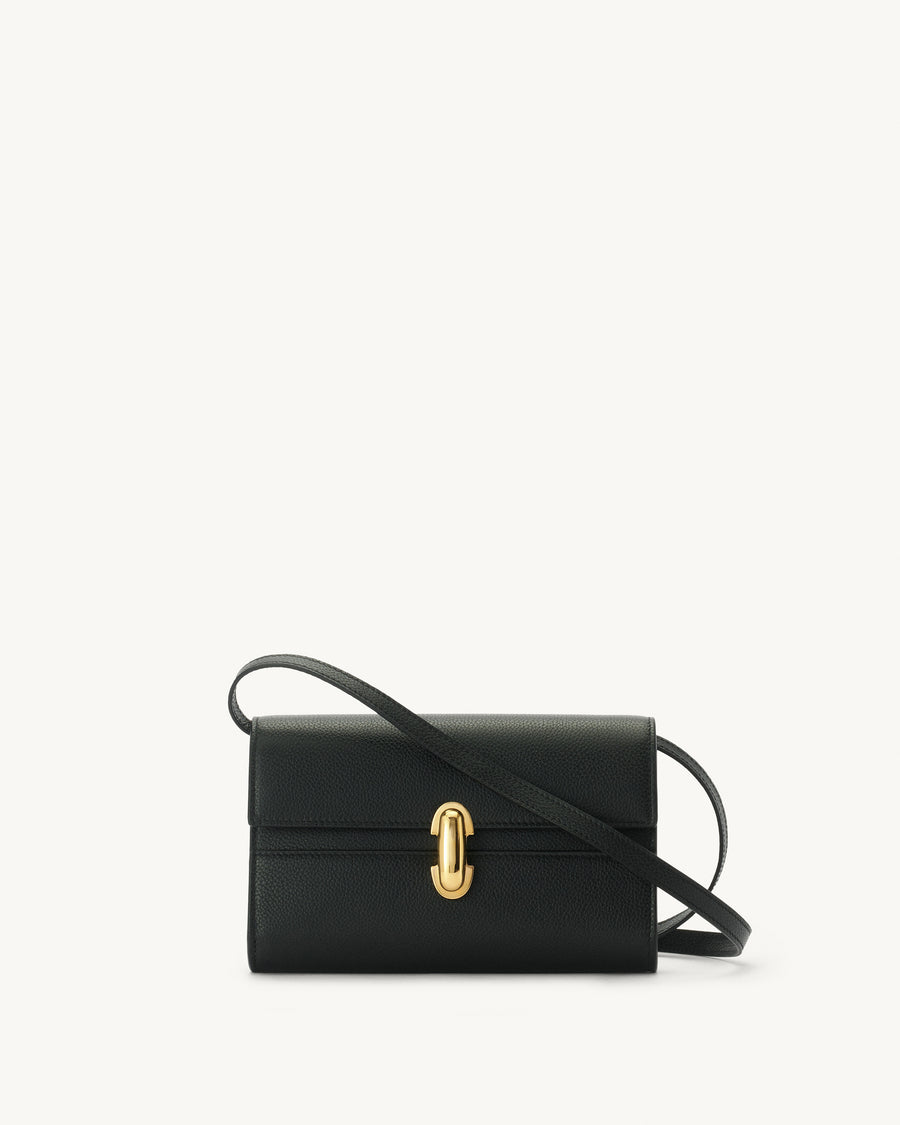 front view of black bag with gold clasp on a white background