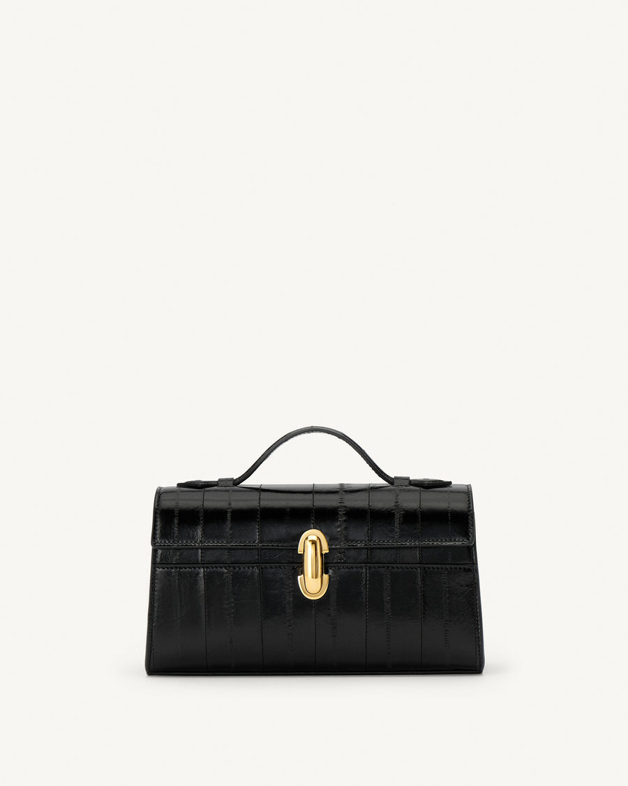 front view of a black eel bag with a gold clasp on a white background