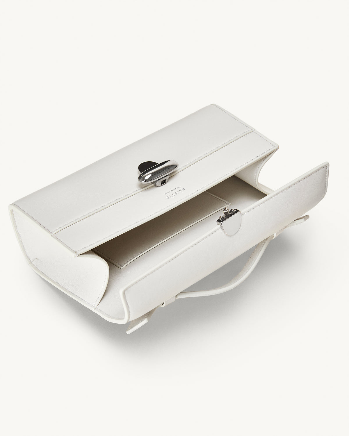 inside view of the Symmetry Pochette handbag in Ivory leather 