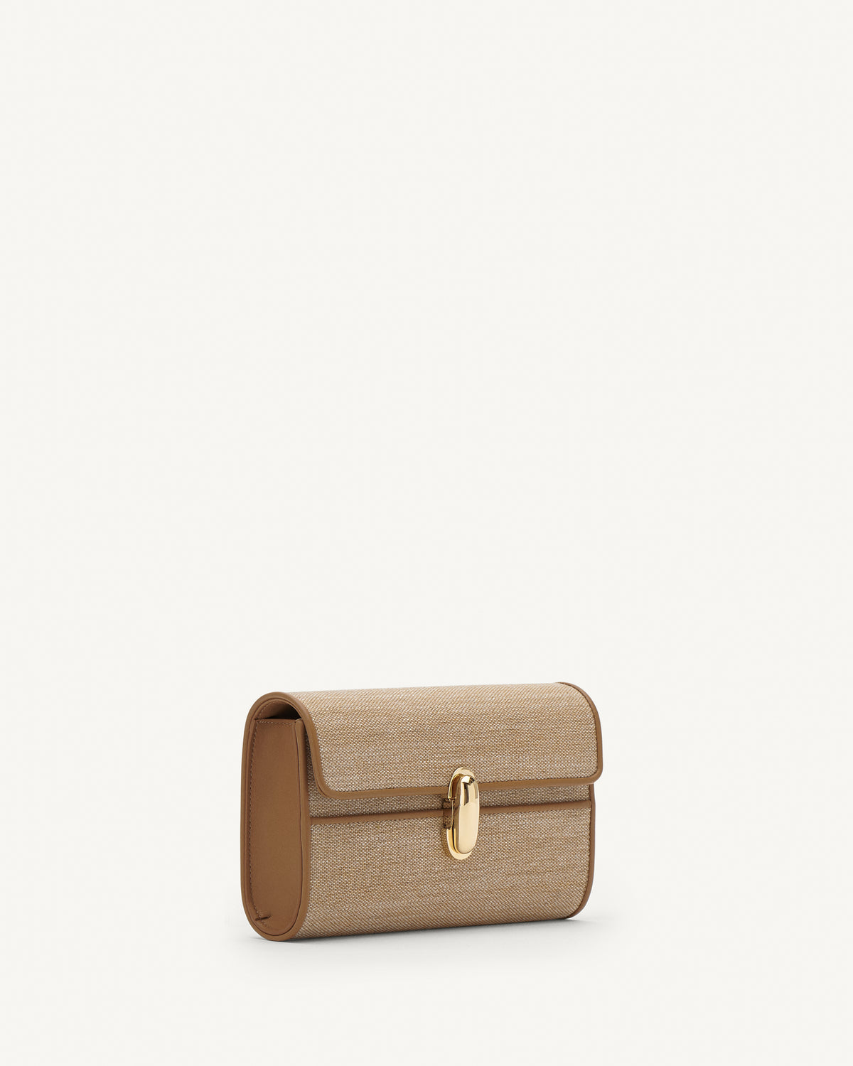 Side view of beige handbag with a brown strap and gold hardware on a white background