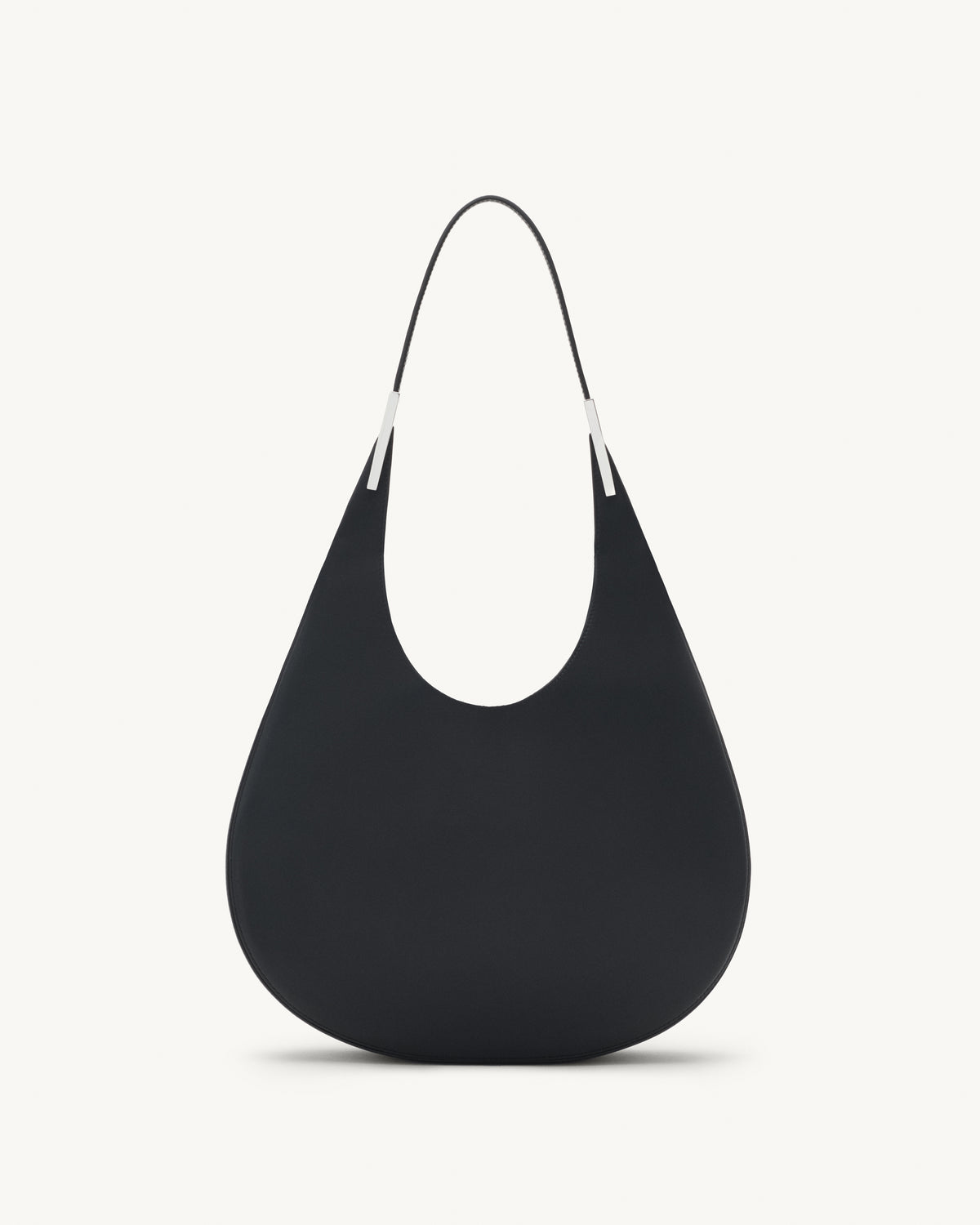 front view of black leather bag with silver hardware on a white background