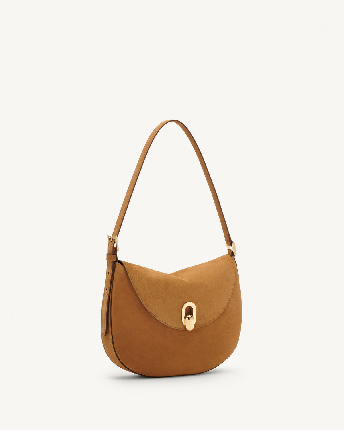 Side view saddle suede handbag with a gold clasp on a white background
