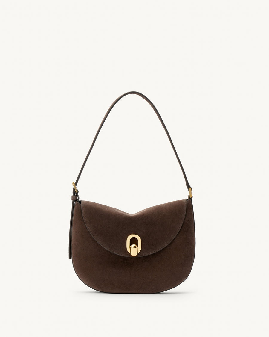 front view of a coffee brown suede shoulder bag with gold hardware on a white background