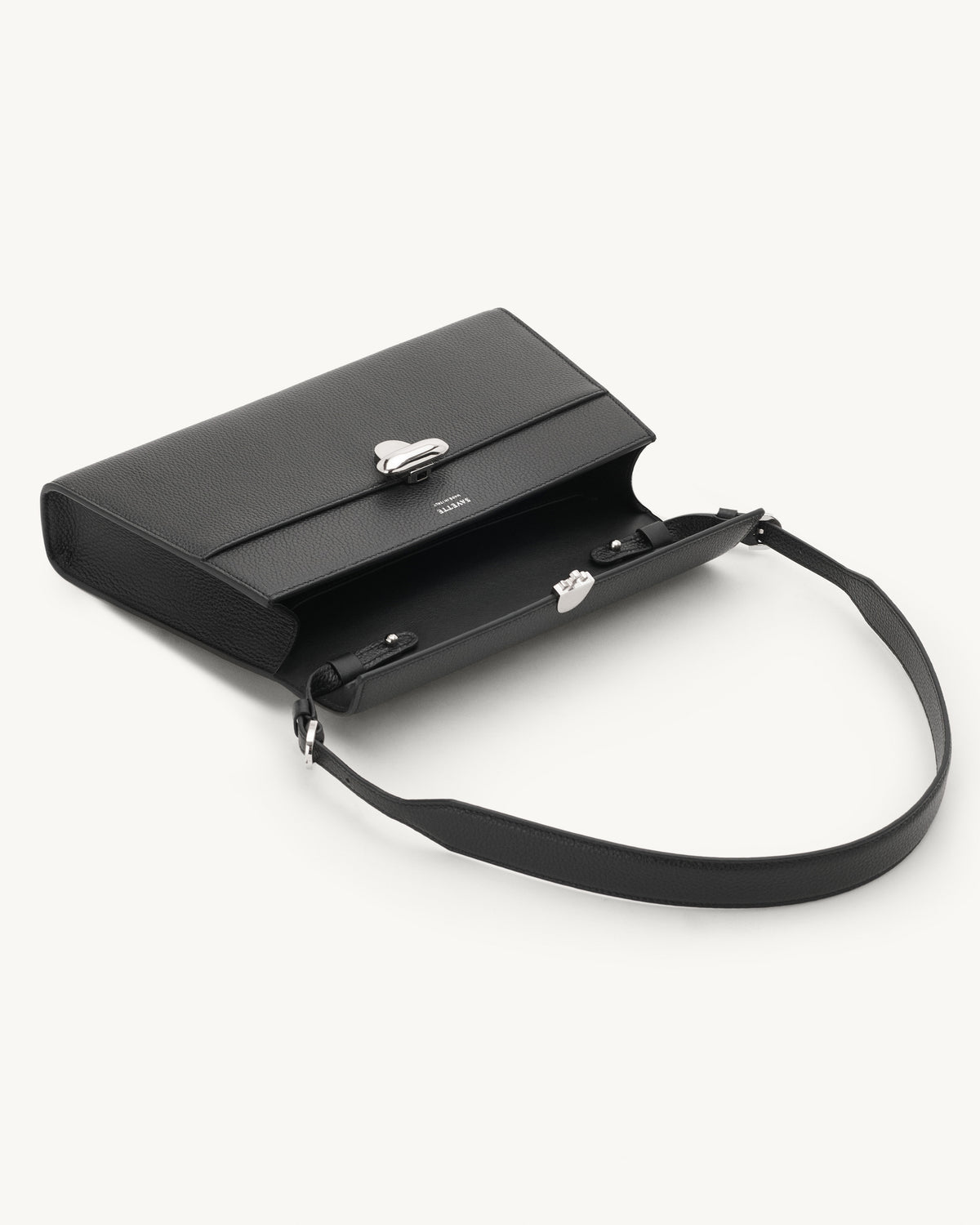 Inside view of the Symmetry Shoulder Handbag in Black Grained Leather 