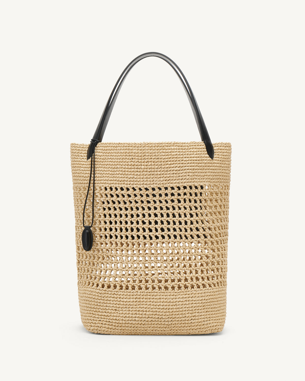 Front view raffia tote bag with black handle on a white background
