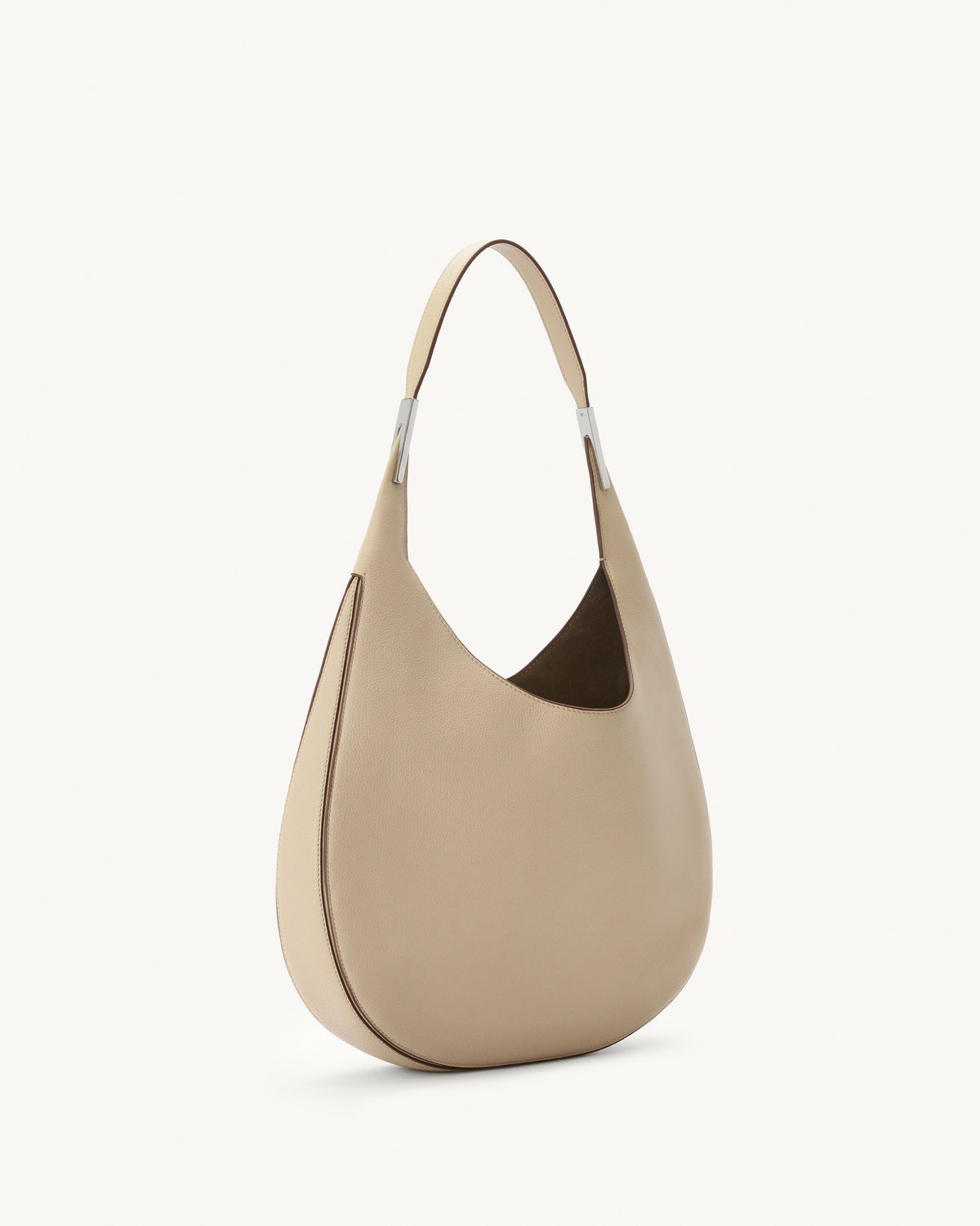 side view of bone beige bag with silver hardware on a white background