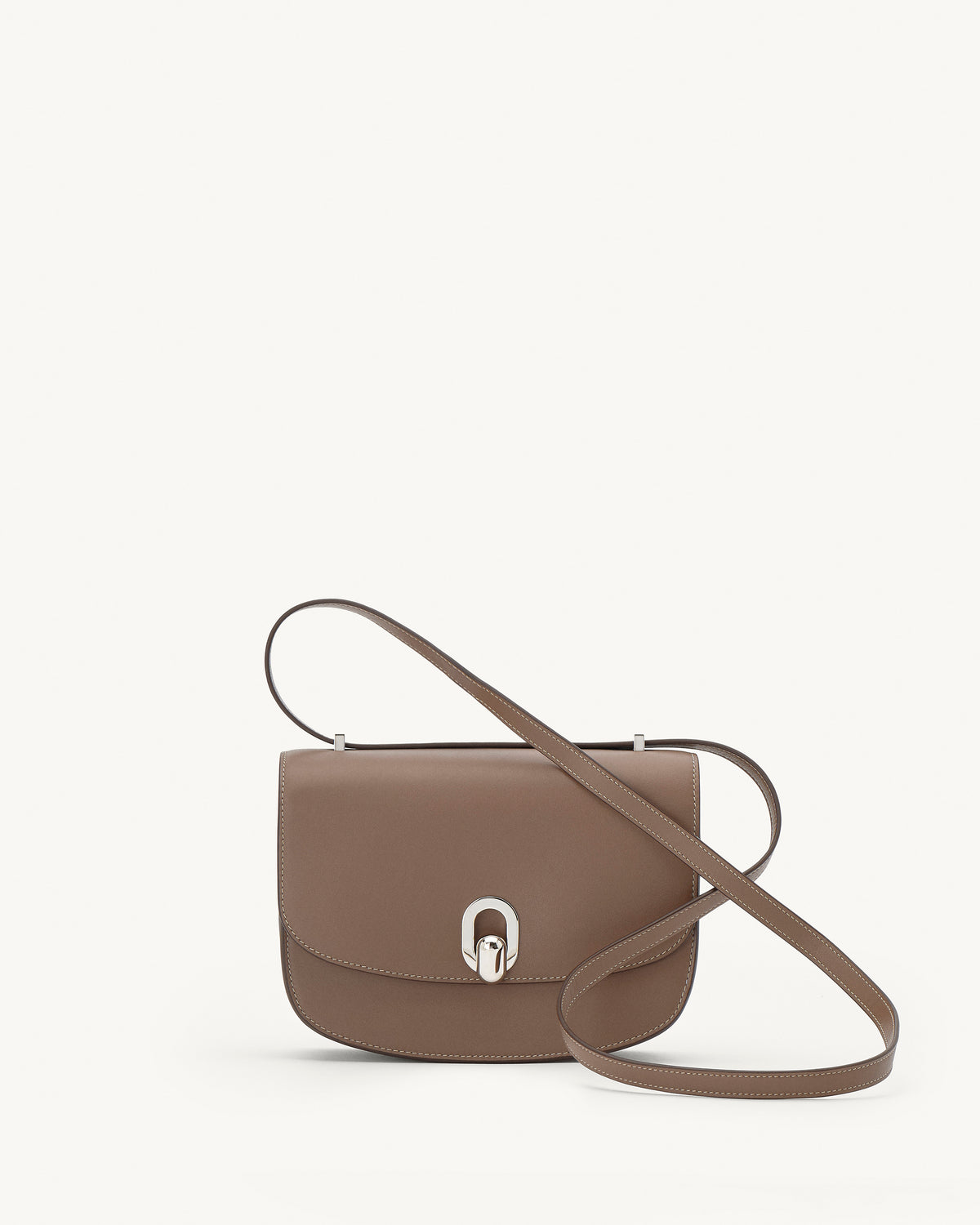 front view of a taupe brown bag with silver clasp on a white background