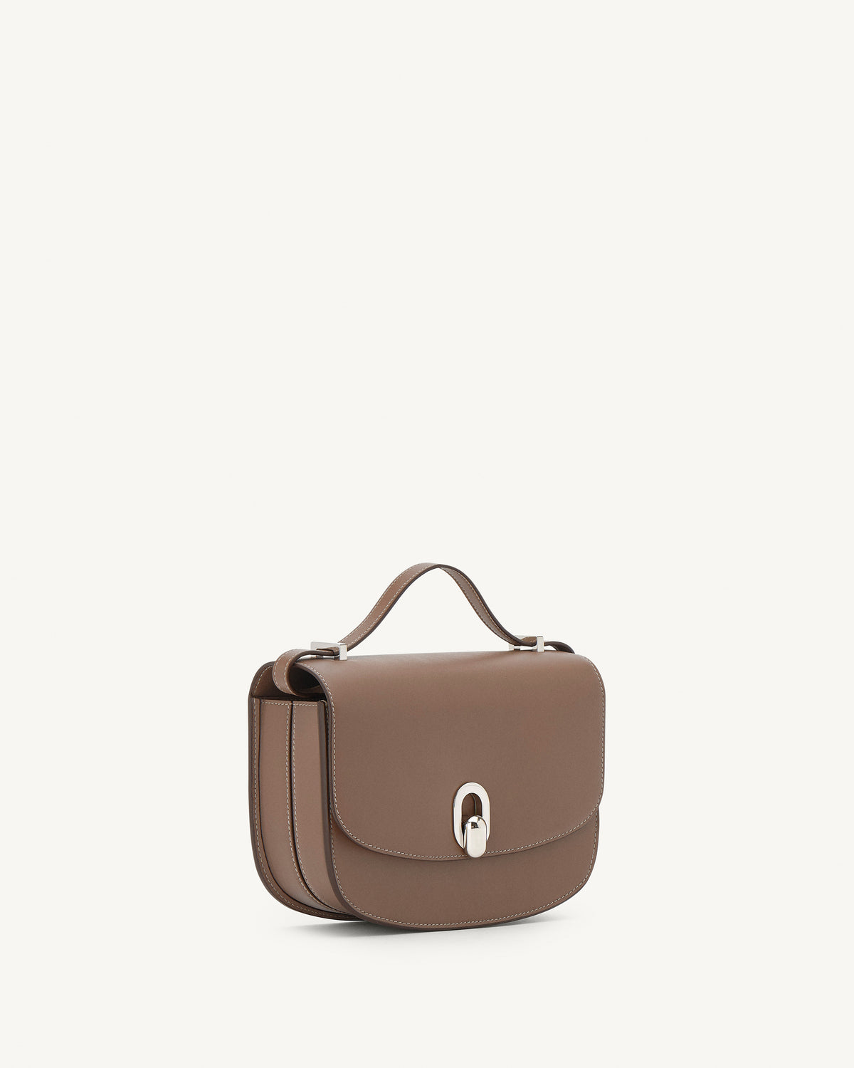 side view of a taupe brown bag with silver clasp on a white background
