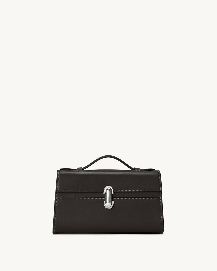 front view of a currant brown bag with silver clasp on a white background